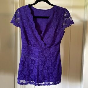 Small, purple lace top, scalloped edge.